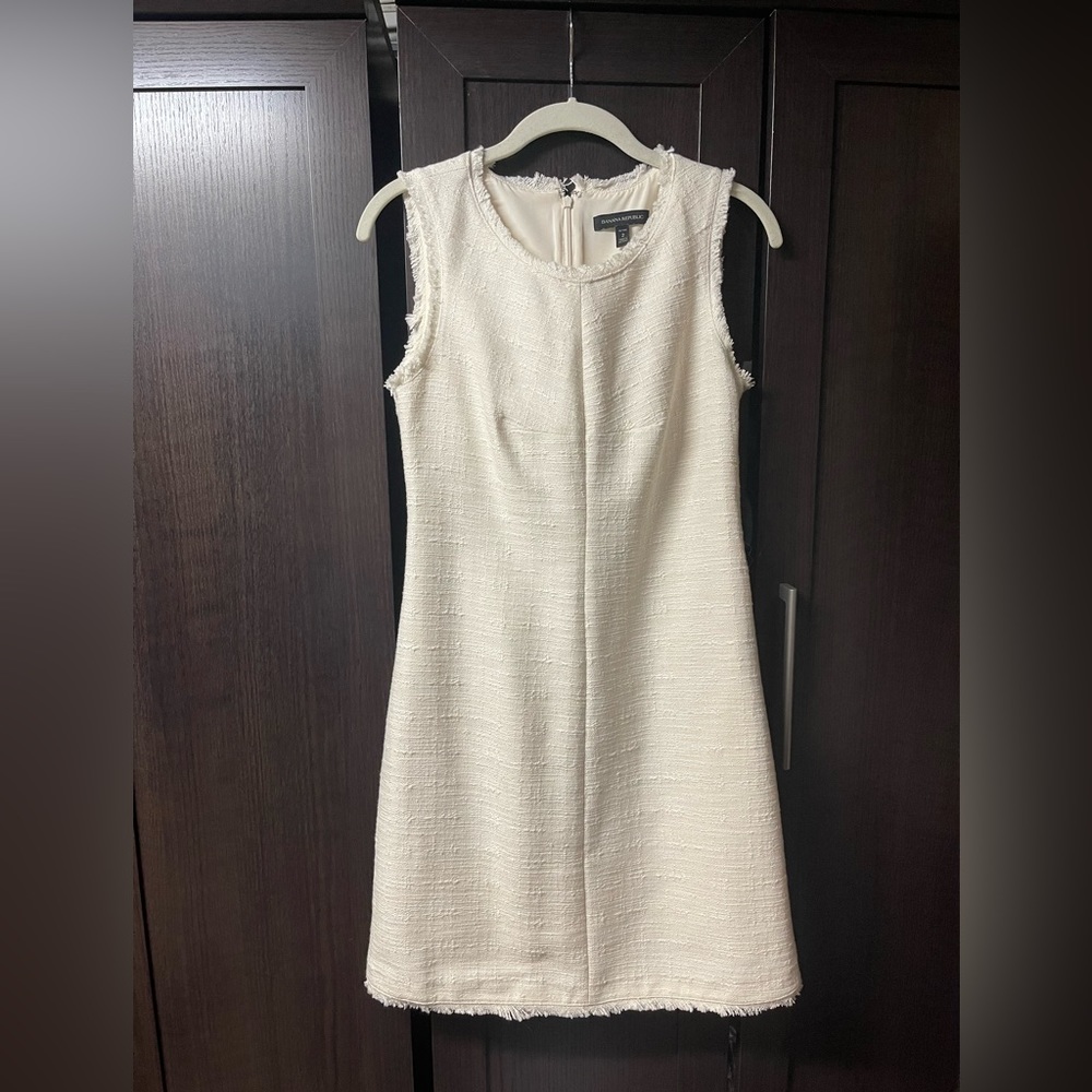 Versatile sleeveless dress. Perfect for baby showers, parties or work.